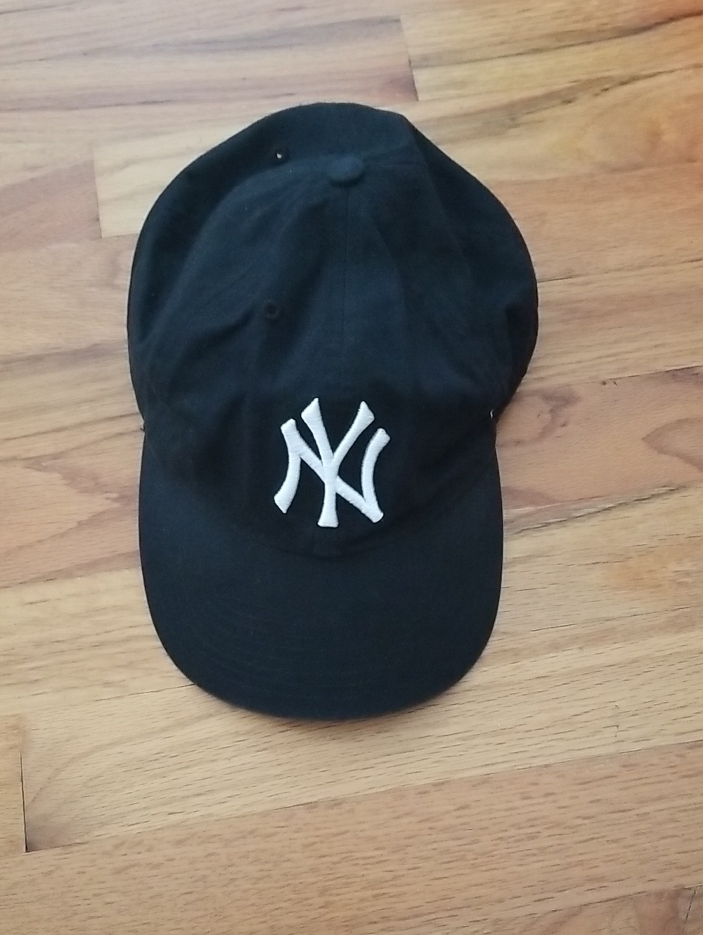 Black Baseball Cap with White NY Embroidered Logo